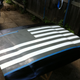 Illustration for article titled How to Paint a Giant American Flag on Your Hood